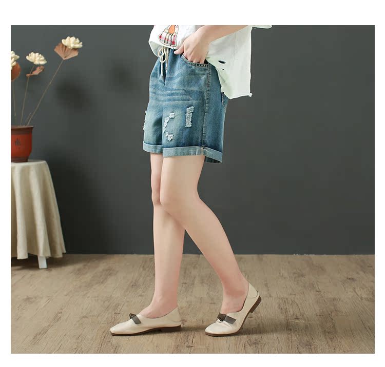 Ren thun eo văn học của phụ nữ quần short mùa hè sản phẩm mới còng cá thêu lỗ quần lỏng - Quần jean thời trang nữ