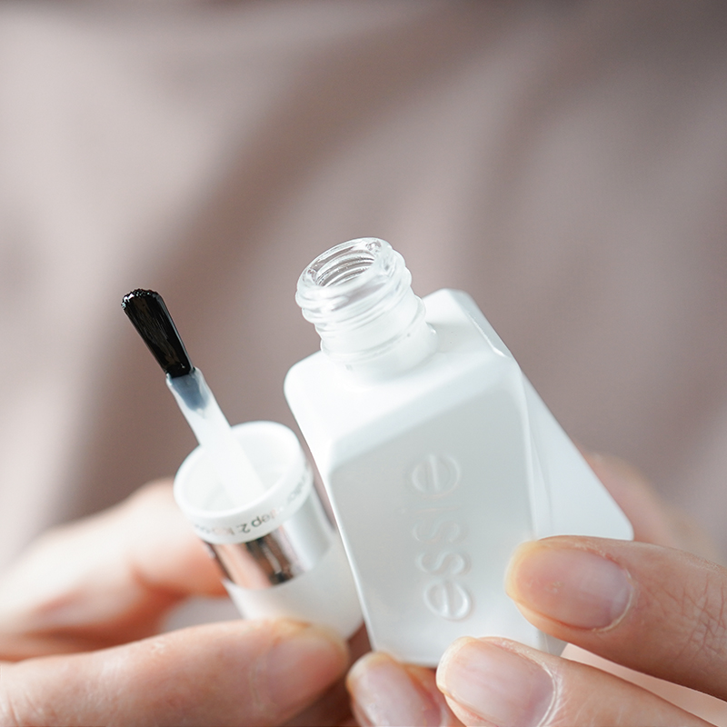 American ESSIE microphototherapy top oil torsion bottle nail polish quick dry bright oil white bottle 00 persistent and free of exfoliating