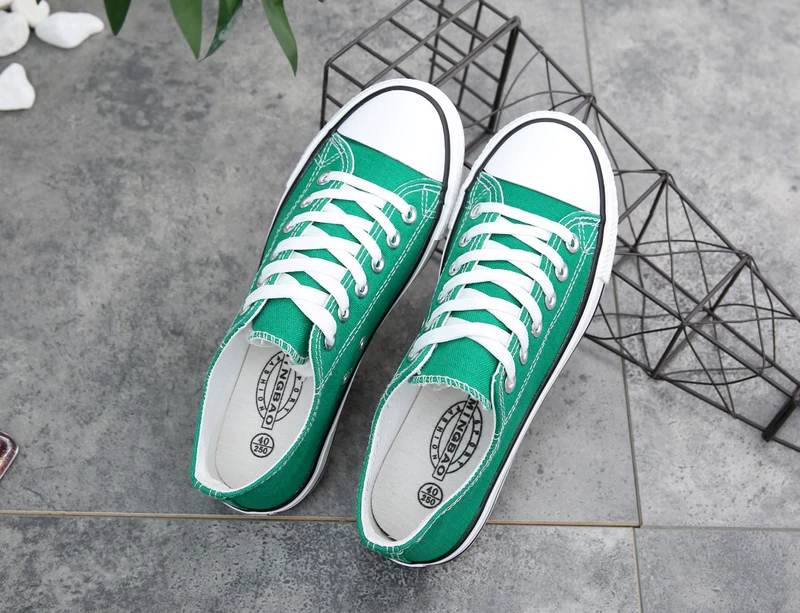 Giày vải đế thấp màu rắn nam sinh viên Hàn Quốc giày đế bằng giày thoáng khí hoang dã giày bình thường giày thể thao trắng