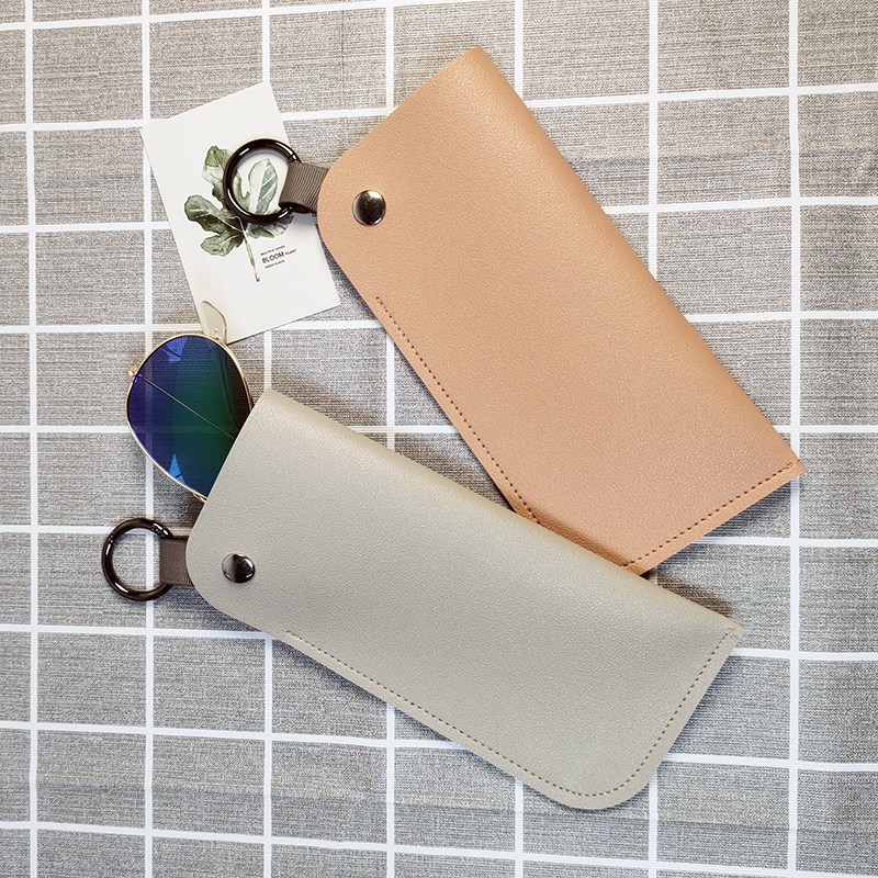 Glasses bag Portable anti-pressure sunglasses case Leather glasses case Simple with hanging ring Sunglasses case Myopia storage bag