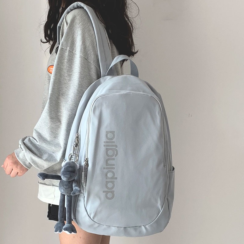 High school student double shoulder bag female college student bag 2021 new tide man casual brief about pure color large capacity bag girl