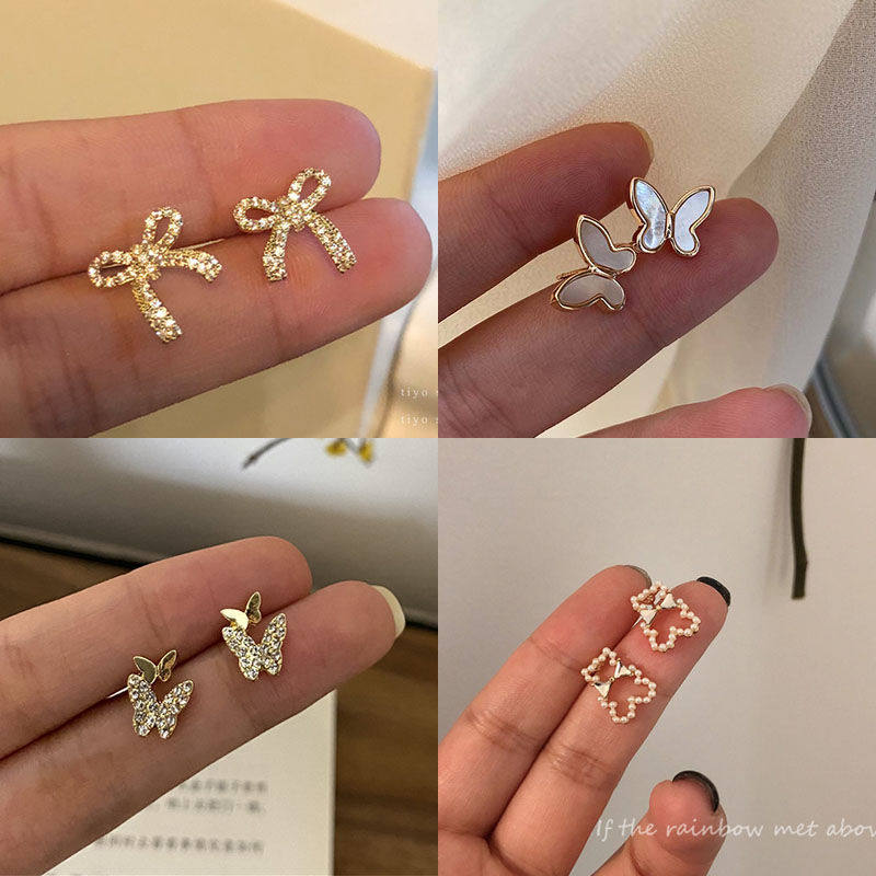 Personality all-match bow earrings small earrings 2021 new trendy ins high-end girl earrings light luxury