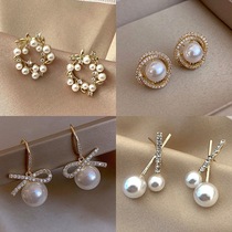 Light Extravagant Bow Tie Earrings Female Niche Design Pearl Earrings South Korea Temperament Net Red Earrings 2021 New Wave