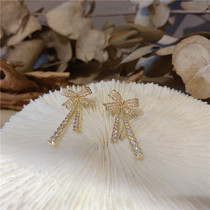 South Koreas East Gate Law style butterfly knot full drill flow Su pearl earrings with sweet and beautiful earrings earrings super-display face