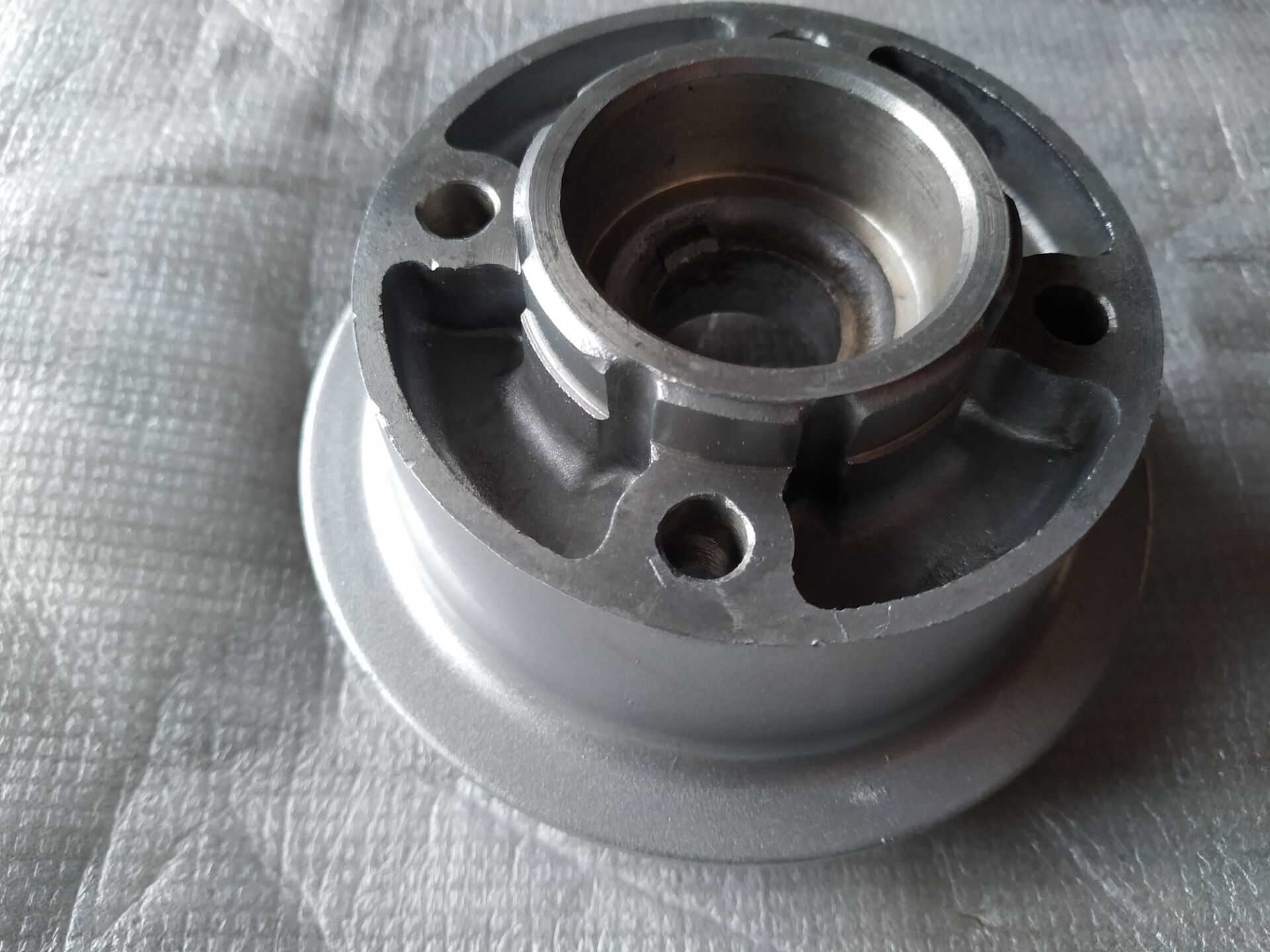 Jincheng AX100 motorcycle parts high quality sprocket seat Changchun AX100 buffer body Aluminum chain plate seat buffer body