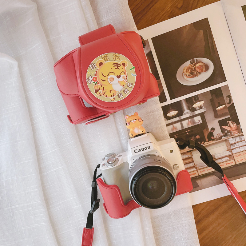 Suitable for New Year's Tiger Year Tiger Camera Package M50 leather jacket Canon 200D Sony ZV1 portable cartoon digital containing bag