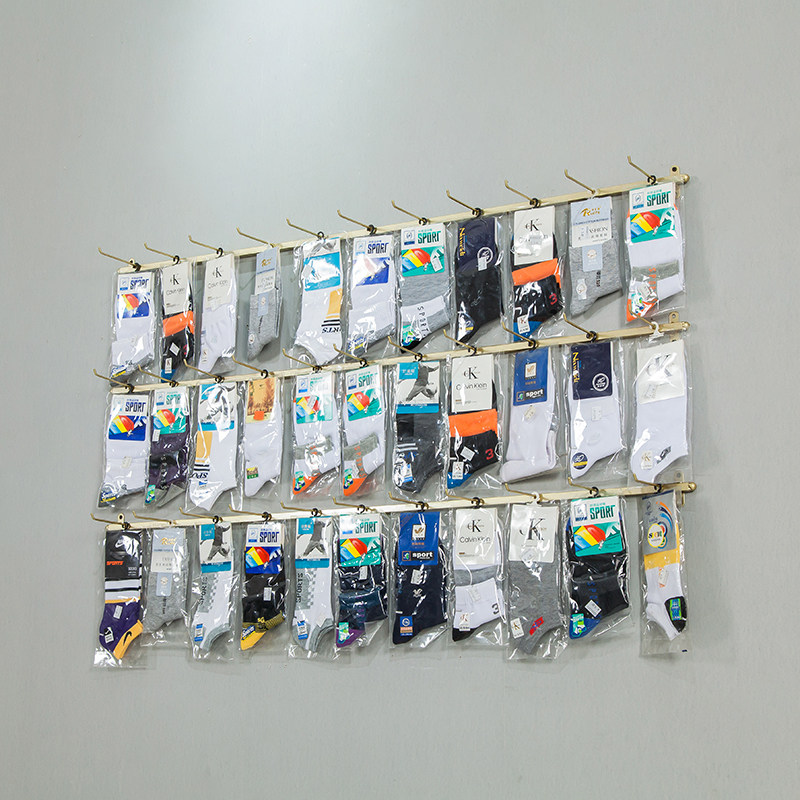 Socks jewelry display stand on the wall mobile phone accessories wall-mounted live silk stockings earrings adhesive hook shelf ear toys