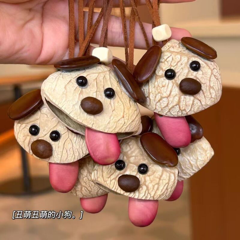 Natural Fruit Shell Dog with Tongue Sticking Out and Shaking Its Head, Fruit Shell Pendant, Indonesian Fruit Shell Wind Chime, Hand-Cranked Stress Relief Sound Therapy Bag Hanging Wind Chime