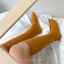 lazy holiday boneless suture calf socks womens Japanese socks girls solid color spring and autumn mid-tube knee socks