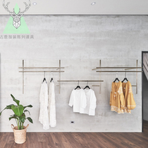 Clothing store display rack wall-mounted stainless steel side hanging womens clothing store shelf design decoration effect diagram