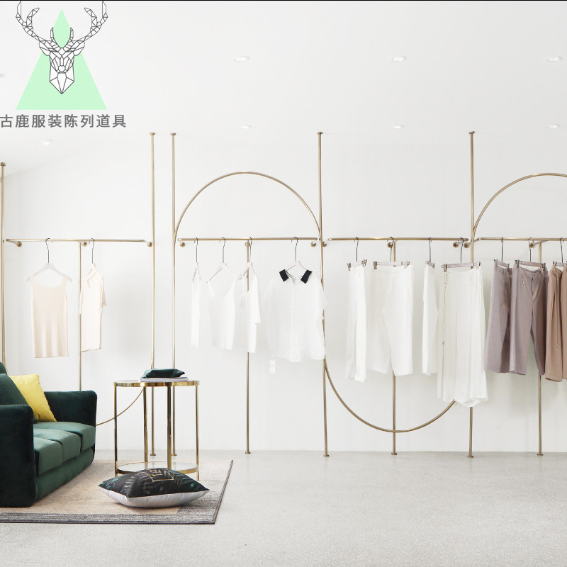 Clothing store display rack on the wall hanging simple side hanging is hanging stainless steel golden hanger women's clothing store shelf
