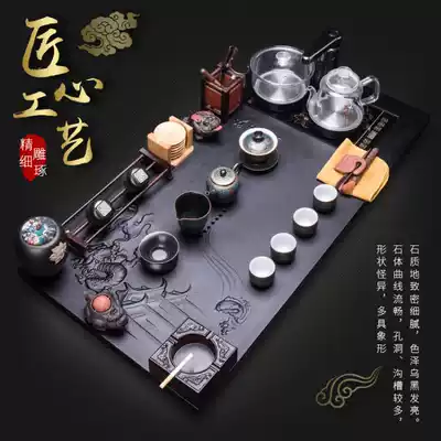 The whole piece of natural Wujin stone relief tea tray kung fu tea set set home simple large one tea table book Living Room