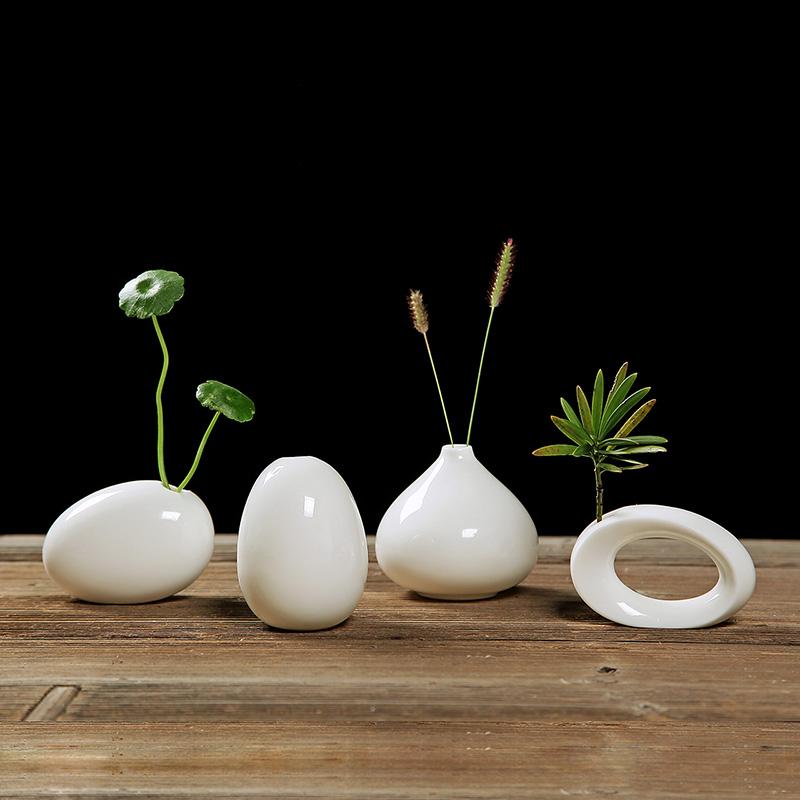 Jun ware dehua white porcelain mini floret bottle move pure white ceramic small and pure and fresh flower implement creative flower arranging flowers