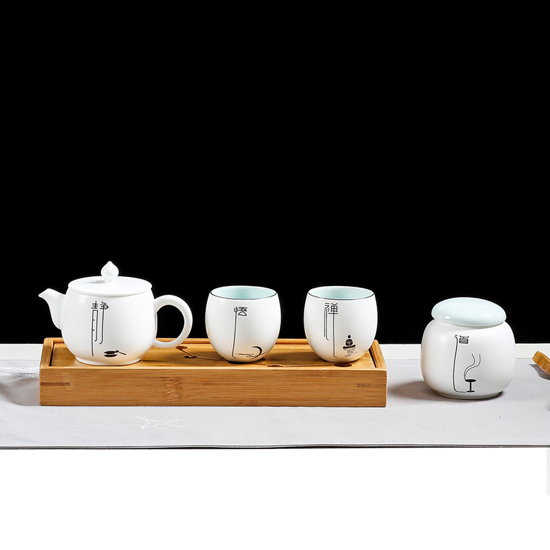 Jun ware fat white kung fu tea set up with porcelain of a pot of two cups of office travel sheet and tea set