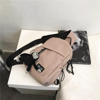 Розовая подвеска, значок