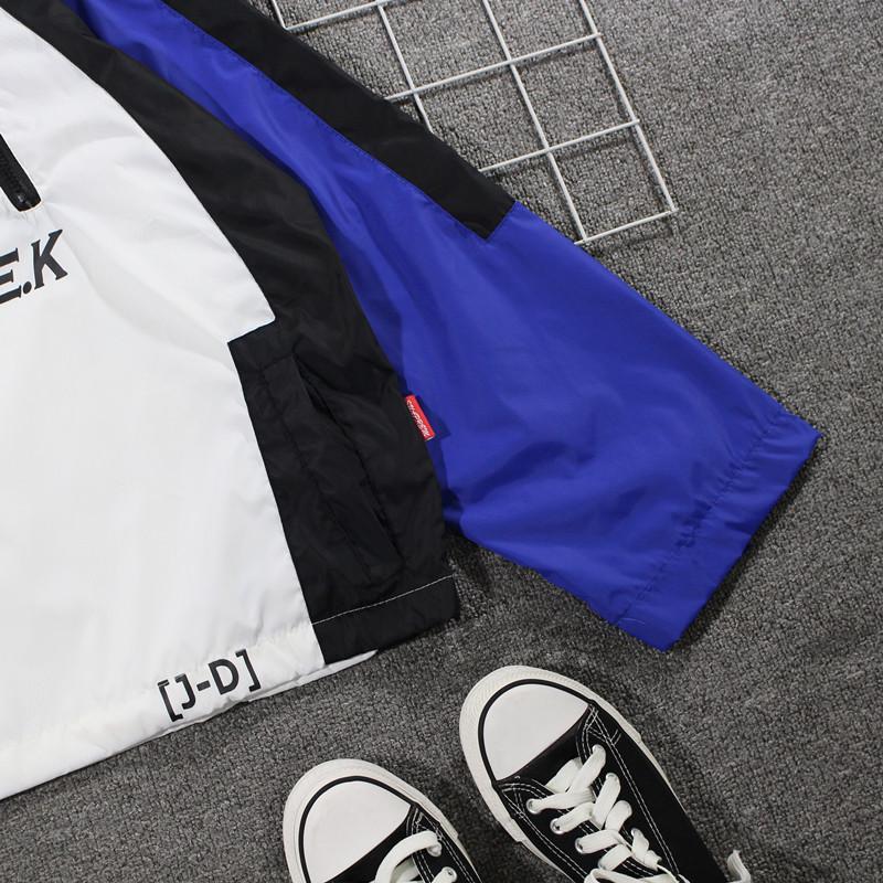 Ins super cháy trench coat nam giới và phụ nữ sinh viên hiphop kem chống nắng áo khoác màu phù hợp với hip hop tide thương hiệu áo khoác mỏng áo gió phản quang