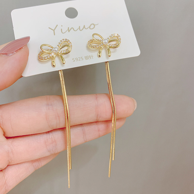 s925 silver needle Korean east gate 2020 new butterfly knot long version flow suearrings earrings a pair of two earrings