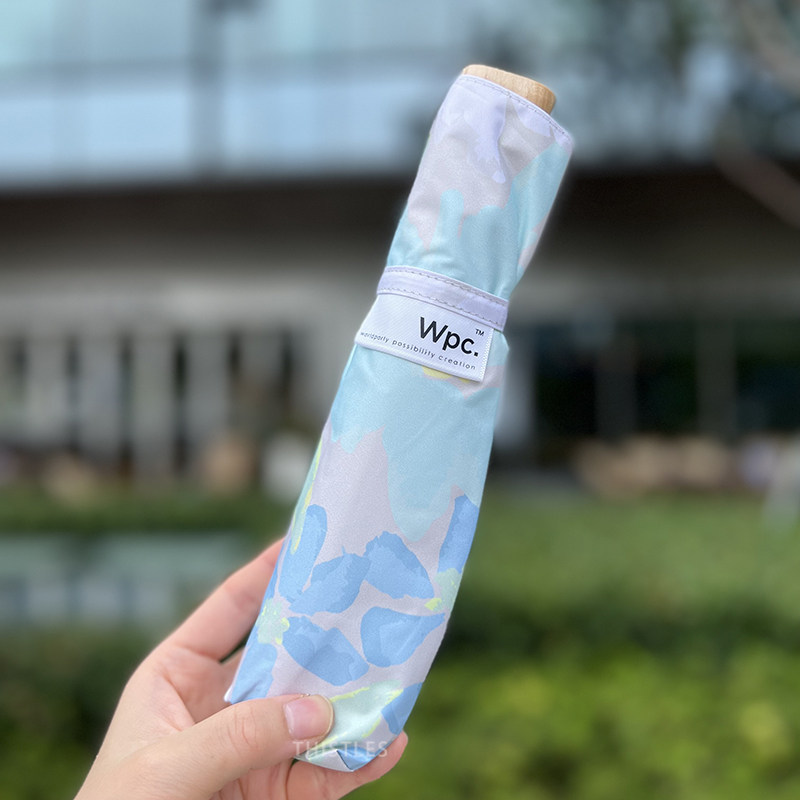 Japan imported WPC sunshade sunny rain sunscreen umbrella tri-fold color glue black glue UV blooming flowers dual-use ultra-light