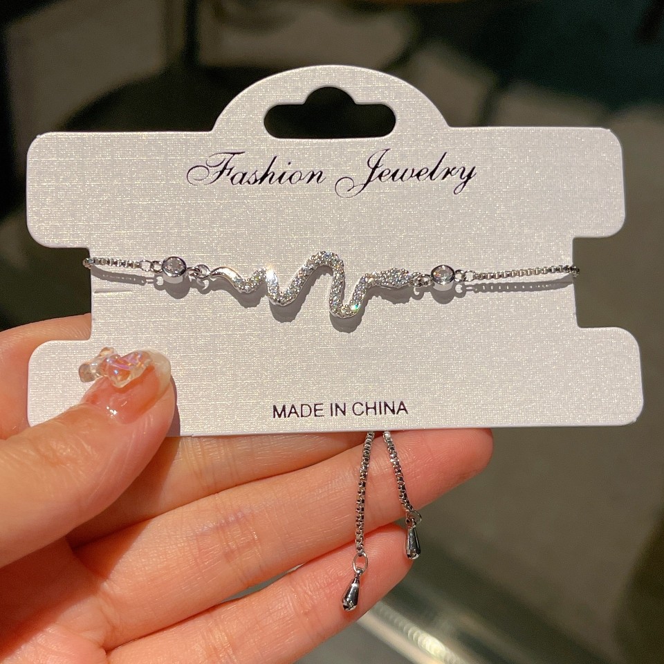 Serpentine full zircons Four leaves small floral bracelet ins sweet and small frescoed bracelet High sensation small crowdhand decoration-Taobao