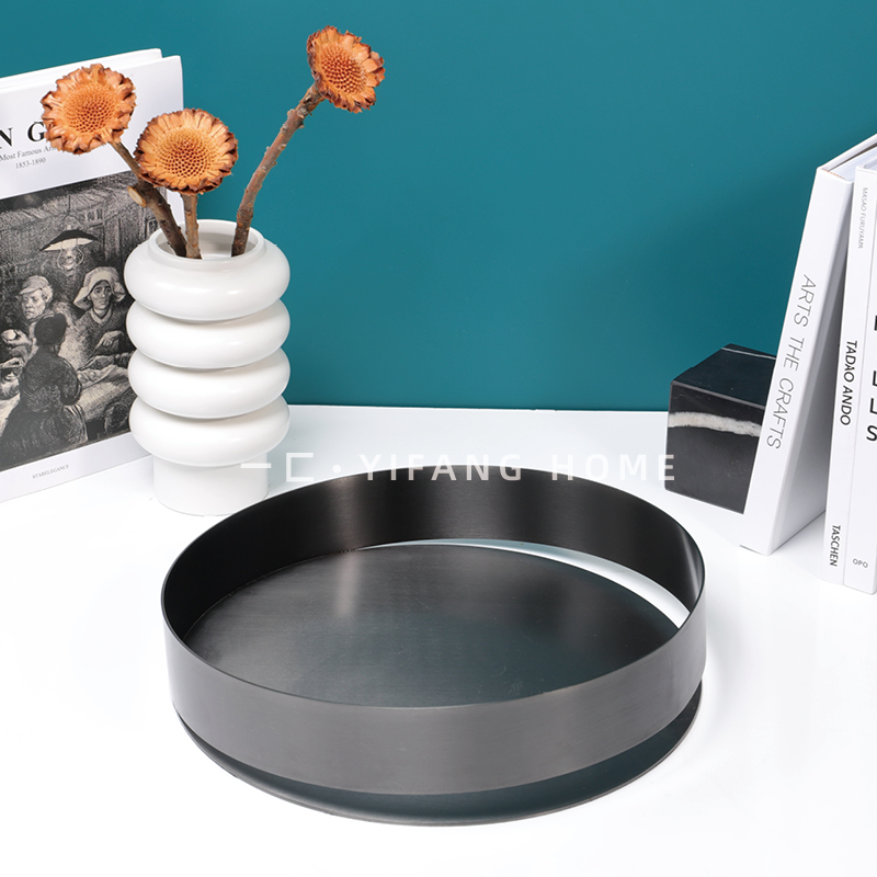 A modern minimalist light luxury metal round open pallet ornaments Model room Sample house display center Coffee table soft decoration