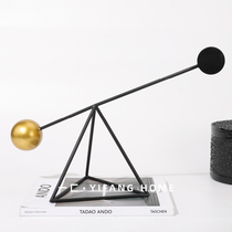 A modern simple model room TV cabinet bookcase geometric metal triangle balance decoration soft decoration decoration