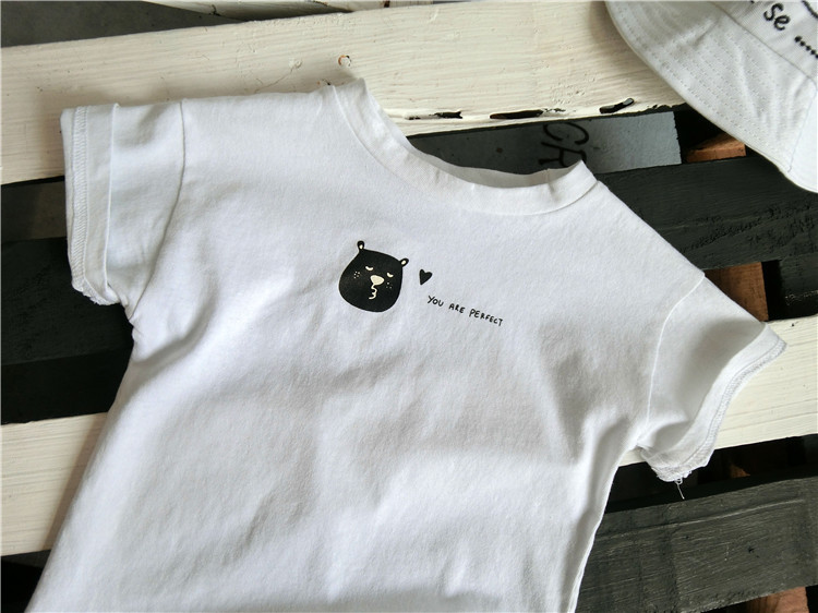 Áo phông trẻ em 18 mùa hè mới phiên bản Hàn Quốc của bé trai áo sơ mi màu rắn bé gái cotton cổ tròn cotton ngắn tay áo thun trẻ em dài tay
