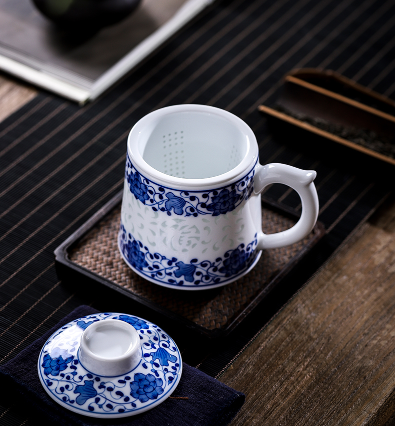 Blue and white and exquisite carving glass ceramic checking with big filter tank capacity of household ceramics and cups with cover