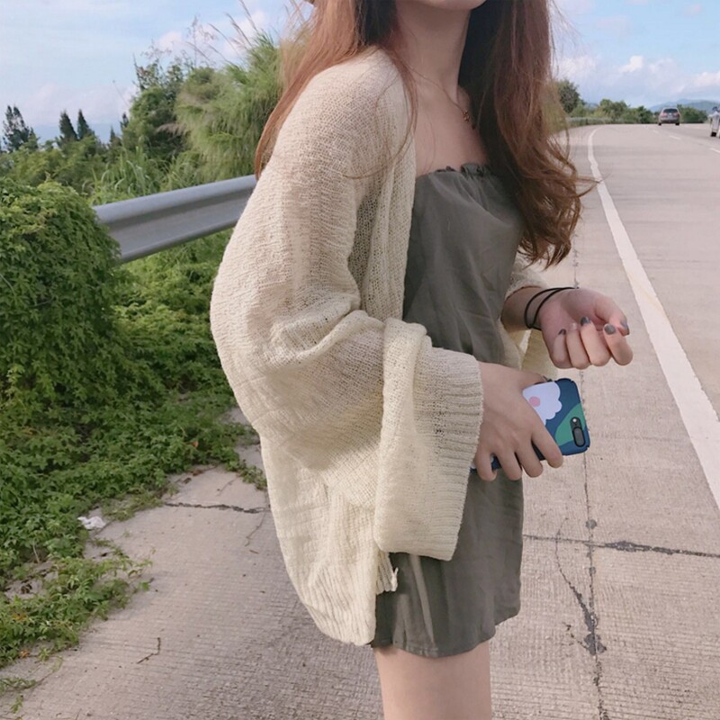 Lazy wind thin air conditioning cardigan hollow sweater female Korean version of loose student summer wear short sunscreen coat