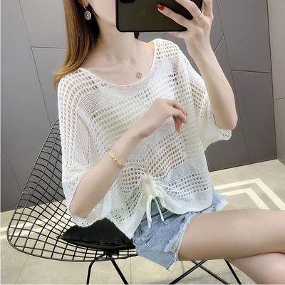 A thin-sleeved, short-sleeved women's summer air-conditioned shirt with cutout design and paired with sun-protective clothing. A short drawstring ice silk top and blouse