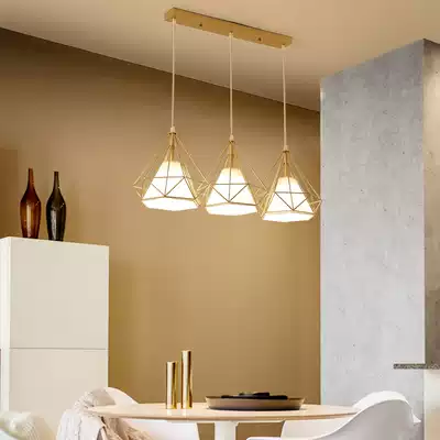 Dining room chandelier Modern simple led three-head dining table lamp Creative personality Golden cafe bar dining room lamp