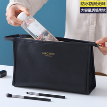 Large capacity cosmetic bag female 2021 New Advanced feel portable portable cosmetics storage waterproof large storage bag