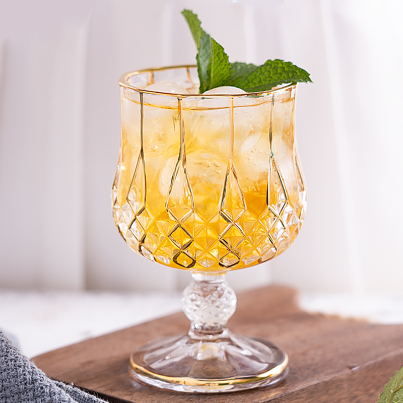 European luxury depiction of gold wine glass high glass crystal glass whiskey glass shorter foot brandy