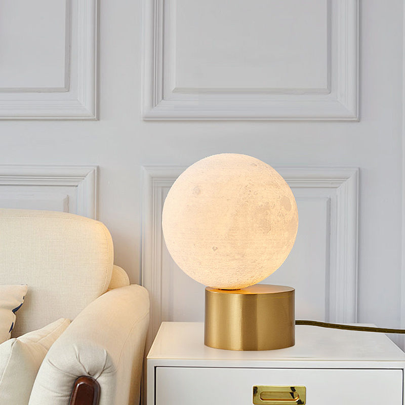 Postmodern minimalist ball table lamp creative living room moon lamp study bedroom bedside net red decoration all copper lamps