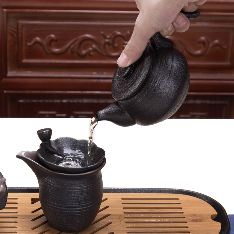 Xin arts edge creative household ceramic teapot Japanese kung fu tea tea is the pot of single pot large black pottery side