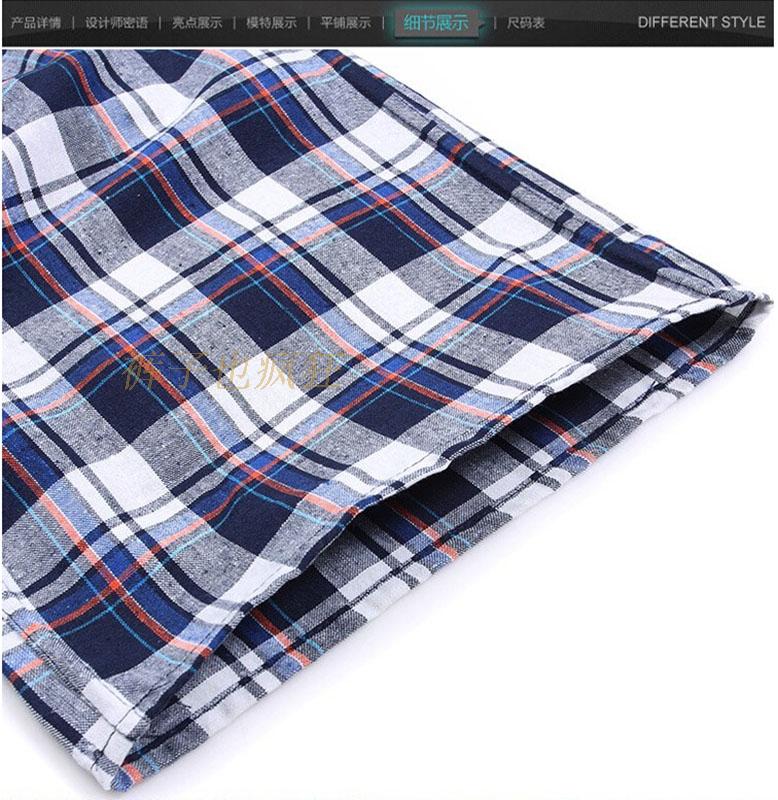 Quần short trung niên nam mùa hè trung niên nam cotton giản dị kẻ sọc năm quần tải quần rộng bãi biển mỏng quần jean đen nam