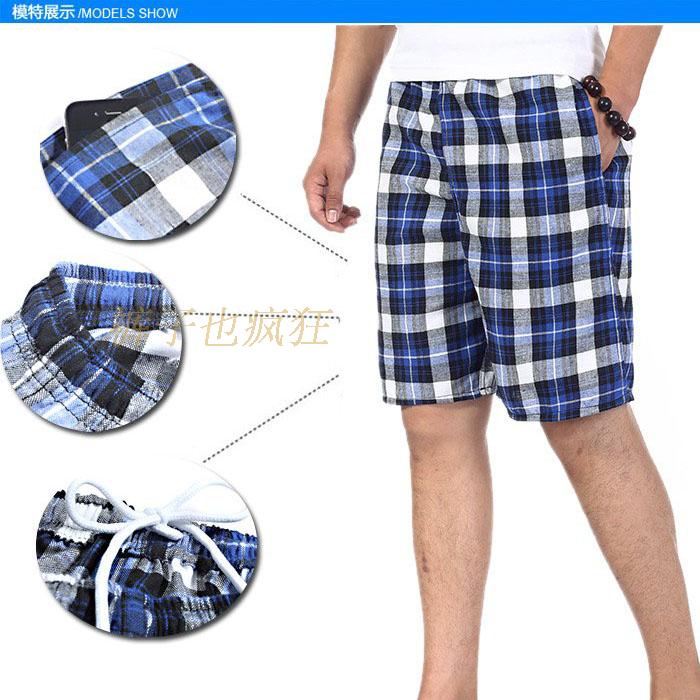 Quần short trung niên nam mùa hè trung niên nam cotton giản dị kẻ sọc năm quần tải quần rộng bãi biển mỏng quần jean đen nam