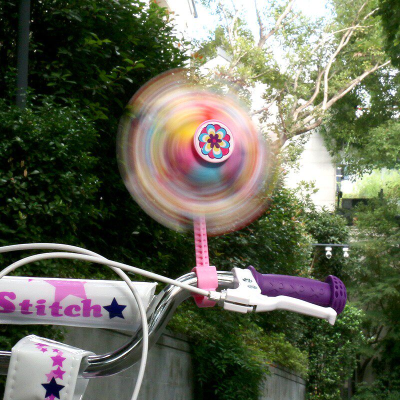 Qi Doll children's bicycle windmill toy jewelry Rotating colorful windmill scooter decorative plastic streamers