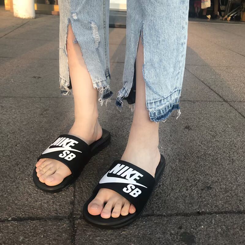 Dép thể thao Nike BENASSI bãi biển bột trắng khâu chữ laser đen trắng logo 343881 dép nam quai ngang