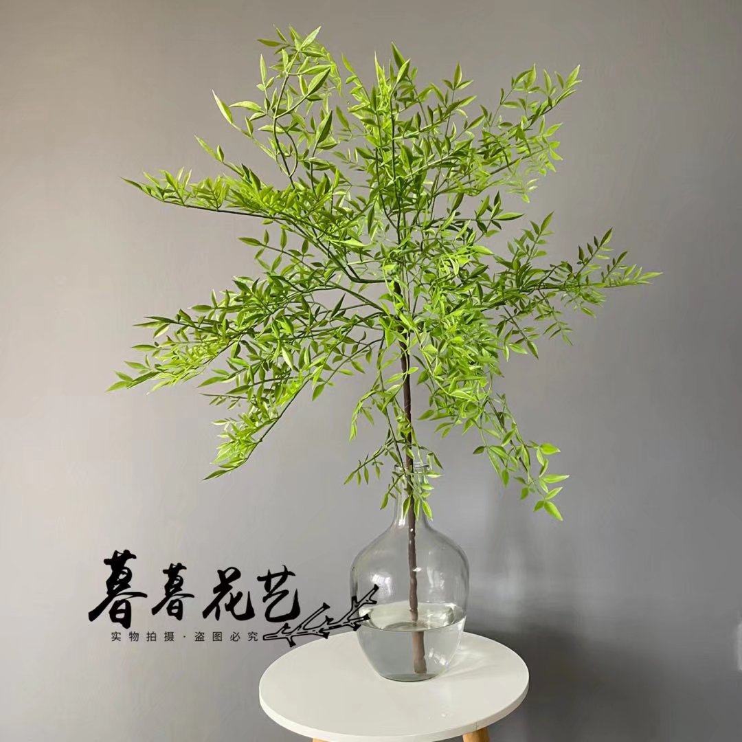 Simulation of green plants Nantian bamboo fake flowers green leaves branches home model room living room floral decoration hanging clock ornaments