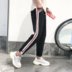 Mùa thu 2018 quần nam harem xu hướng phiên bản Hàn Quốc của nhà tạo mẫu tóc hip hop hoang dã xã hội kẻ gầy quần áo nam cao cấp Quần Harem
