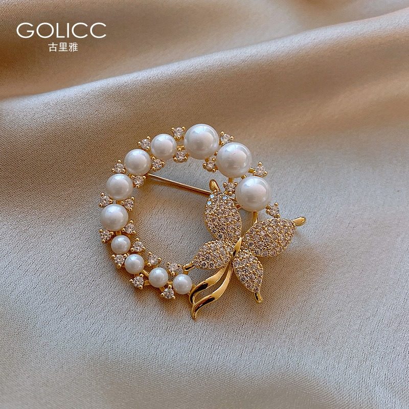 High-grade pearl brooch women's anti-light buckle pin suit fixing clothes ornaments 2021 new fashion summer