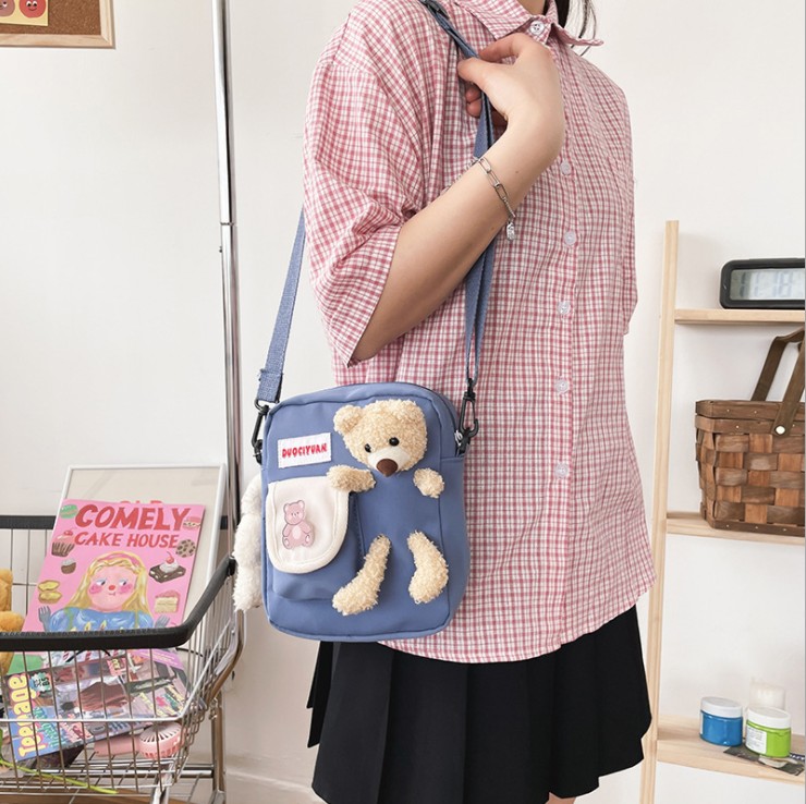 Korean version of ins Harajuku cute funny personality bear doll soft sister student canvas messenger bag Japanese small bag Meng