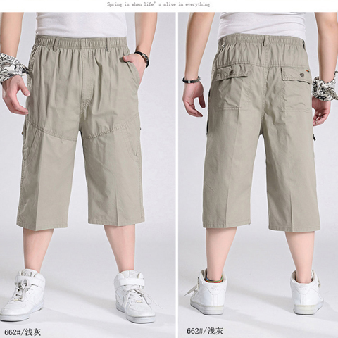 Mùa hè chất béo quần short nhiều túi giản dị 7 điểm cộng với phân bón để tăng thêm quần rộng cho nam cotton mỏng quần áo thể thao nam