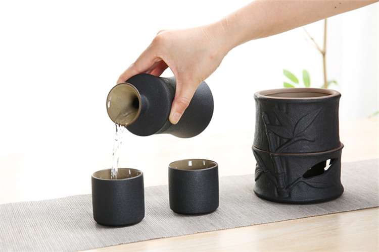 Rough gốm đen phong cách retro một nửa caty phong cách Nhật Bản ấm rượu đặt nồi lẩu sưởi ấm bếp gia đình bình rượu một nồi hai cốc ly rượu pha lê