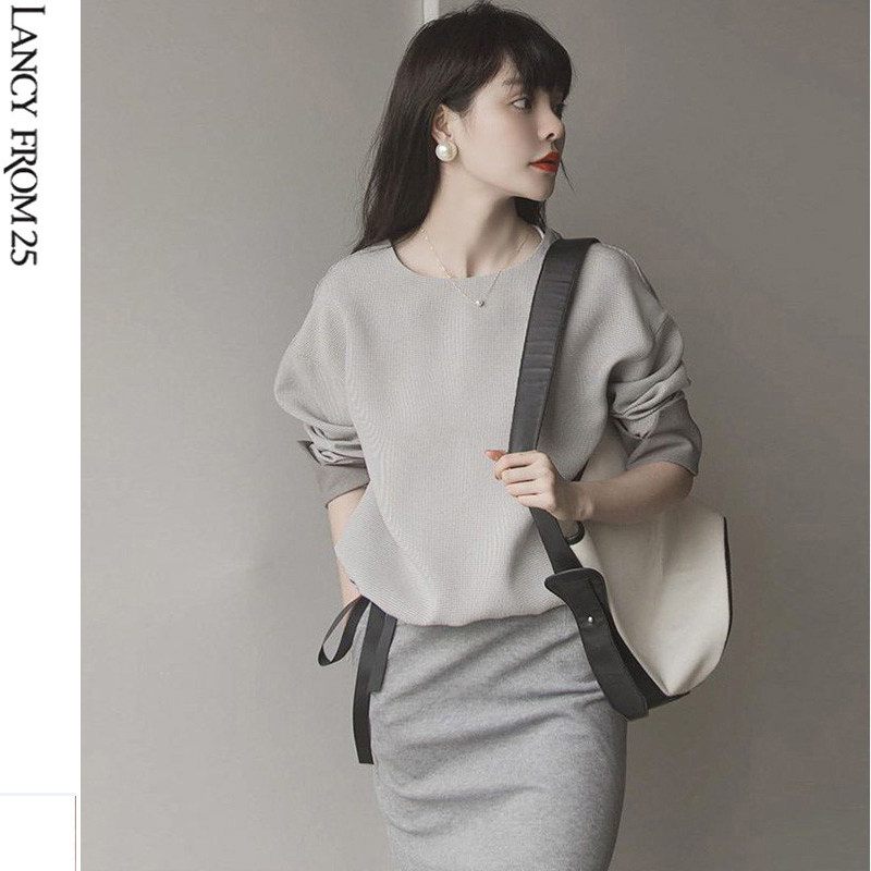 Langzi 2022 autumn new women's clothing temperament high-end spring and autumn light cooked royal sister wind sweater skirt two-piece suit