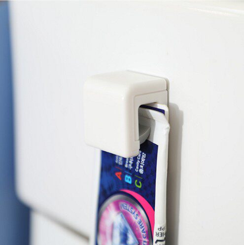 KM toothpaste storage rack toothpaste hook wall-mounted toothpaste clip seamless paste cleanser rack hanging clip hook clip