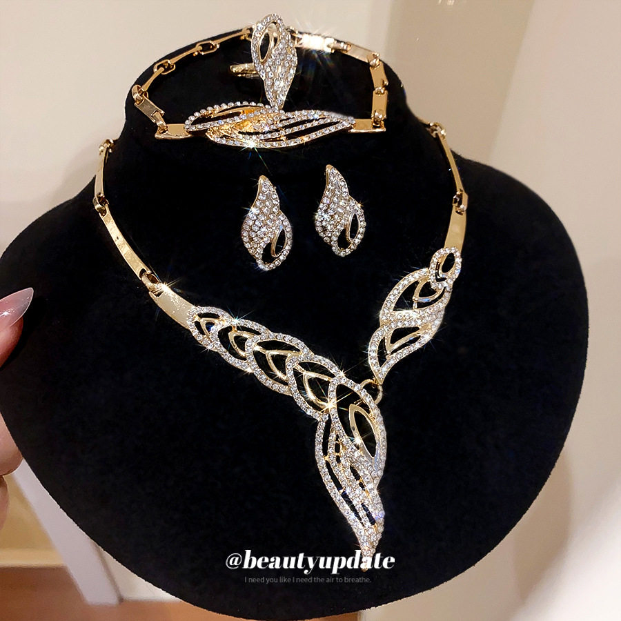 European and American cross-border diamond-encrusted oval earrings, rings, bracelets, necklaces, light luxury and high-end niche clavicle chain jewelry sets