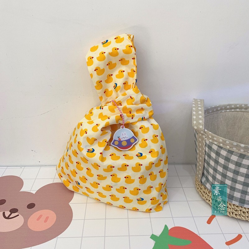 Little Yellow Duck2020 new pattern tide mobile phone Bag lovely tearful Wrist bag portable Canvas bag take a walk Japan and Korea Cartoon coin purse