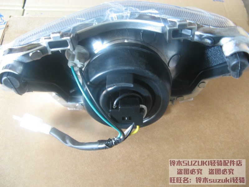 Phụ tùng xe máy chùm cong Lingmu Saisheng 110 Saisheng QS110-2 lắp ráp đèn pha phía trước đèn led xe