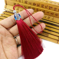 Кисточка бордового перегородчатого цвета